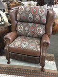 Bustleback Extra Tall King Wingback Pushback Recliner
Leather: Inback & Seat Cushion 
Seat Cushion Boxing: 
Nailhead: 16 & 3 On Front Posts
Dark Walnut Stain
Front Rail, Wings: 
Legs: Ball And Claw Legs